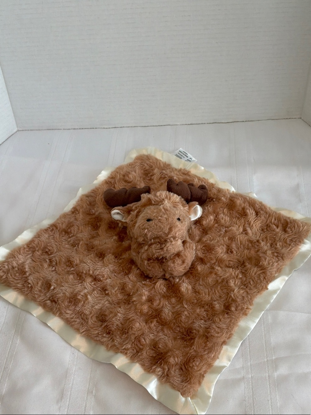 Baby Essentials White Care Tag Plush Toy Label featuring moose cream satin trim